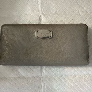 Michael Kors wallet. Could use a little cleaning